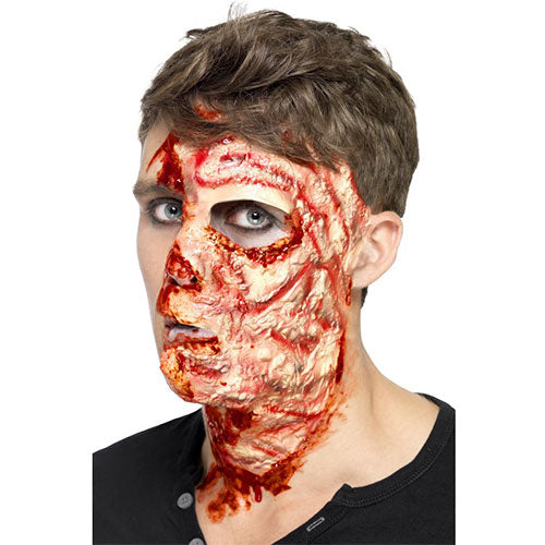Face burned and scarred