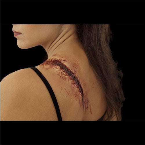 stitched up bloody scar