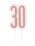 Bougie d'anniversaire sur pic 30 ans rose pailleté 7 cm