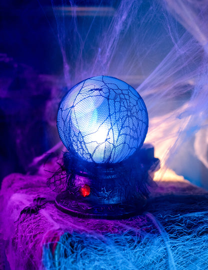 Boule de cristal lumineuse et sonore 19 x 13 cm