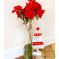 Branche fleur de poinsettia rouge 75 cm