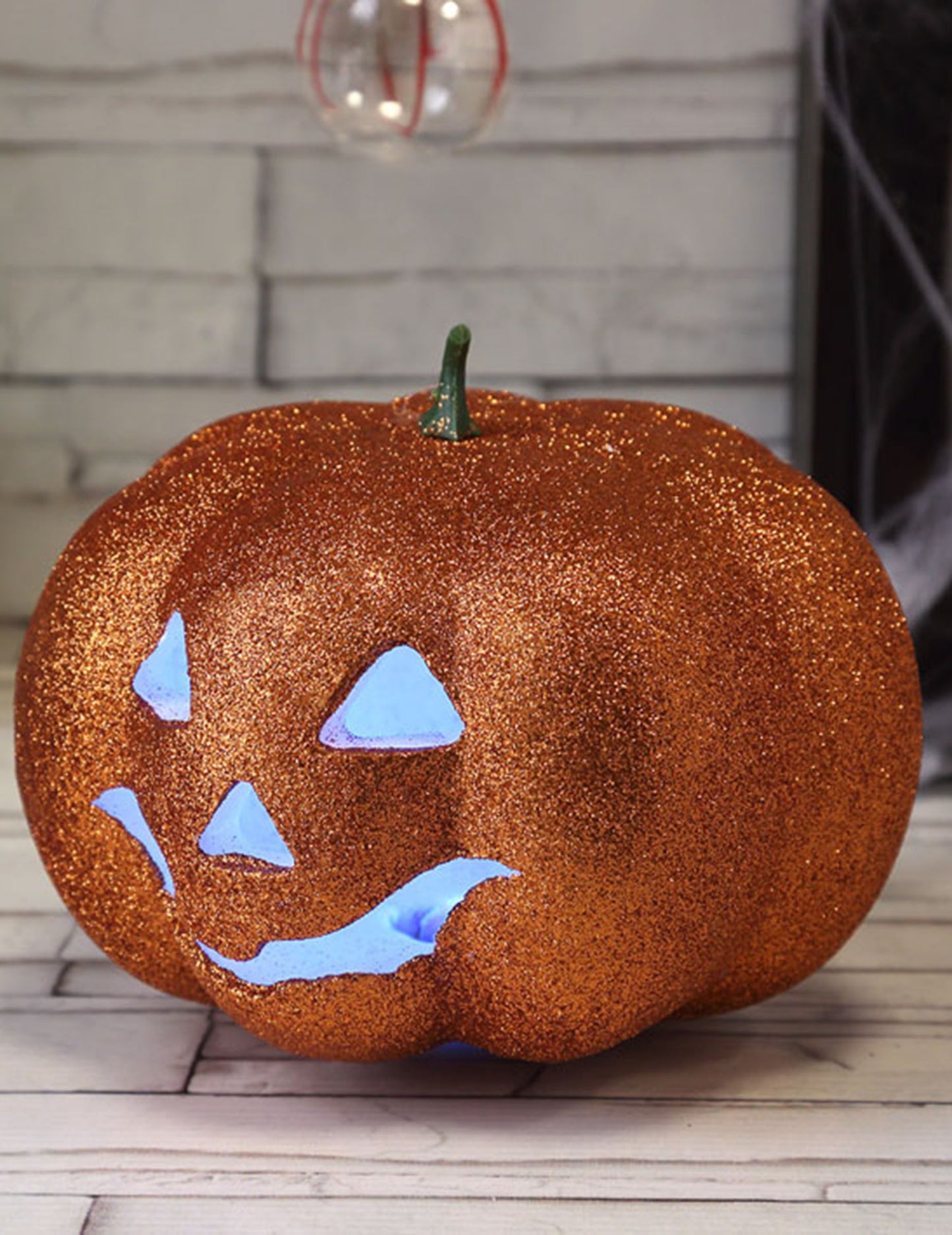 Citrouille Halloween lumineuse pailletée 17 cm